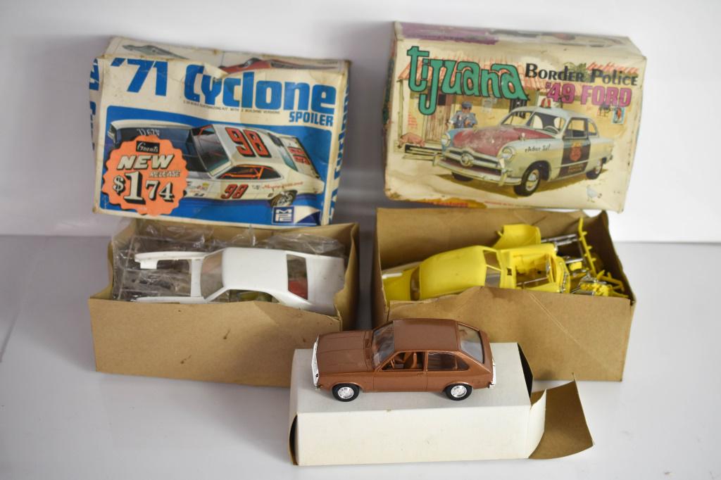 Models & Promo Car: Grouping includes (3) cars including a promo car 1979 brown chevette, and (2) models, a 1949 Ford, and a 1971 Cyclone, completeness unknown, but look complete. Chevette measures approx. 6.25"l.