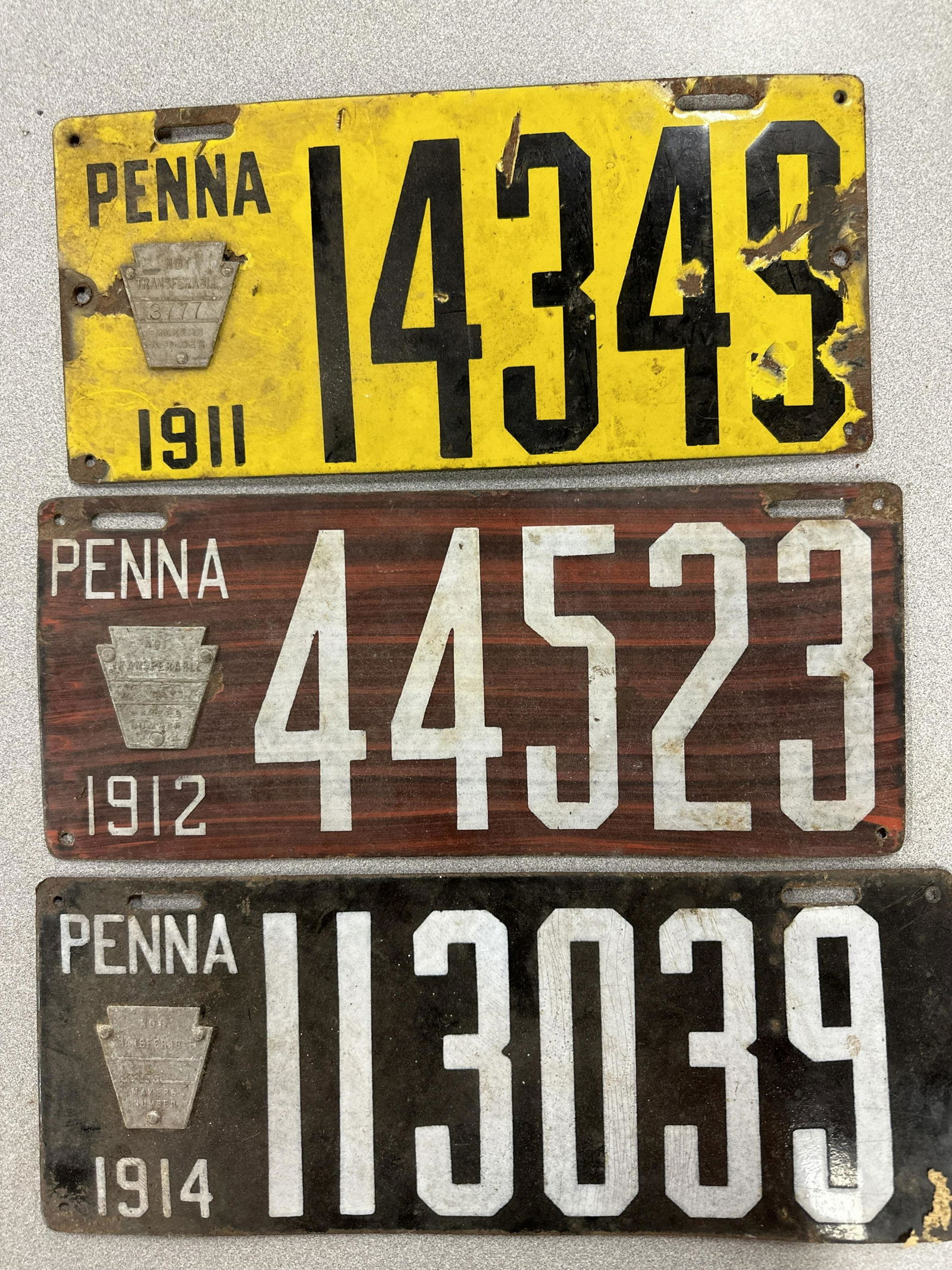Vintage license plates, 19 11, 19, 12, 19 14 (1 of 2)