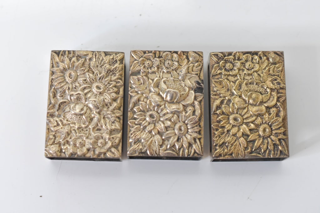 S. Kirk and Son Repousse Match Safes: S. Kirk and Son Match Safes Grouping includes: (3) sterling Silver Match Safes measuring approx. 1.5" x 1.25" x .5"