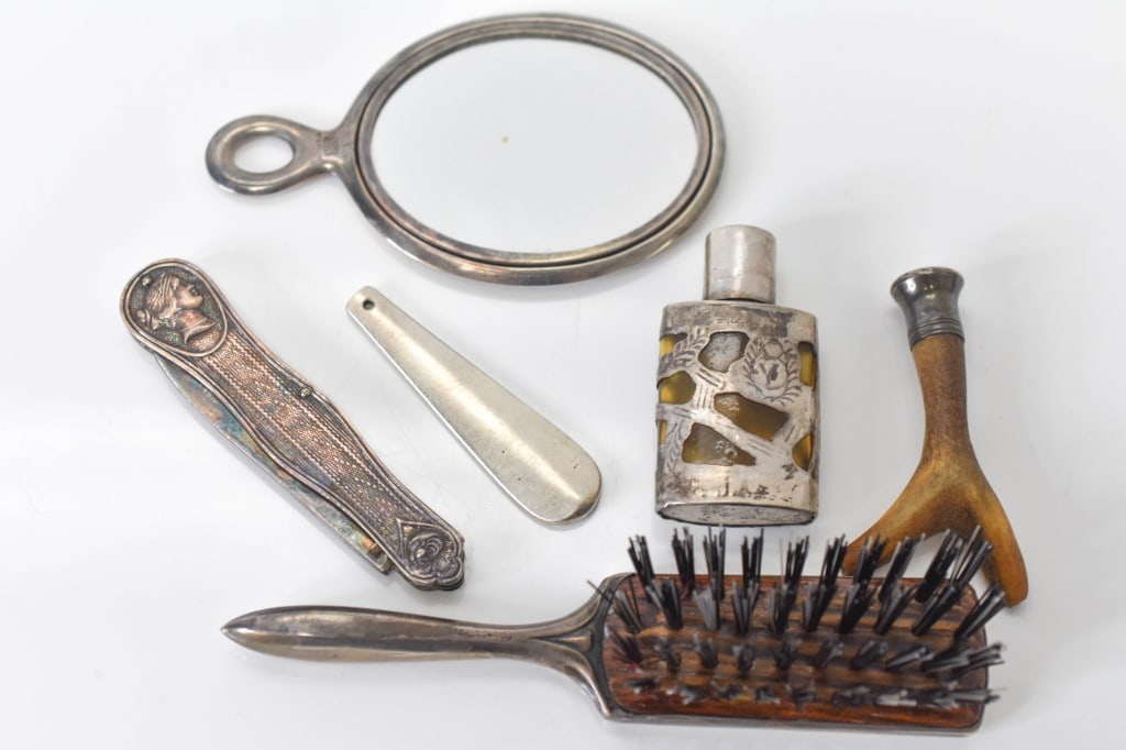 ANTIQUE STERLING SILVER LADIES FOLDING FRUIT KNIFE: ANTIQUE STERLING SILVER LADIES FOLDING FRUIT KNIFE WITH NUT PICK AND ETCHED KNIFE BLADE, Sterling Silver Perfume bottle, horn, brush, mirror and part of sterling spoon.