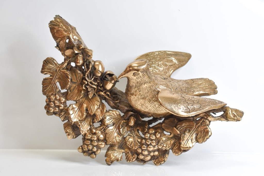 Realist Cast Brass Bird & Nest Wall Sculpture: Vintage detailed bird with hatched egg on branch with leaves and nuts sculpture. Measures 17 in long x12 in high x 6 in deep.