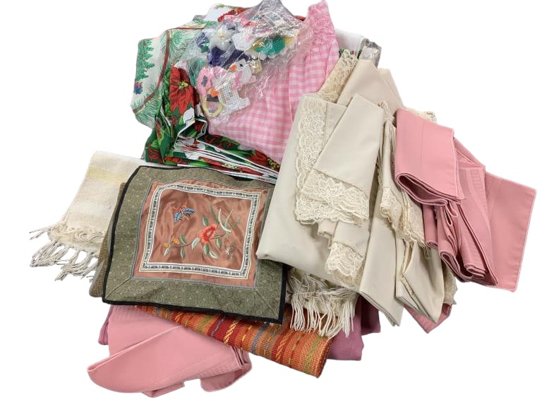 Table Linens: Mix of holiday and everyday tablecloths, napkins, table runners.