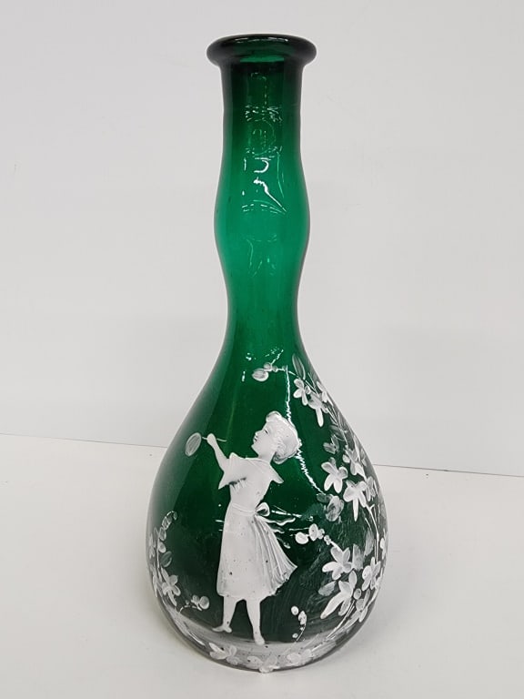 Mary Gregory Green Bottle Glass Antique: 1800's Mary Gregory Enamel decorated on Victorian Glass. Green Bottle Approximately Measures 8 inches.