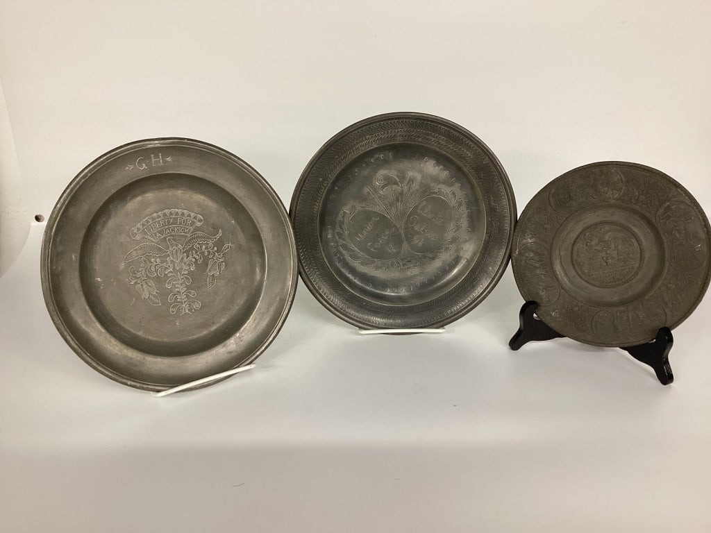 Old Pewter Chargers (Signed): Includes Vintage Pewter plates, some legible writing on the back. Measures 9"