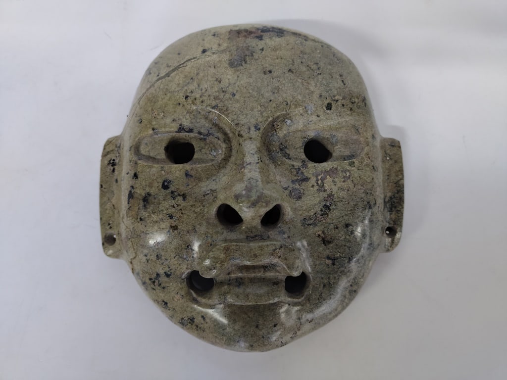 Shamanic Or Olmec Mask In Stone: Possibly serpentina . 6in. x 6in.
