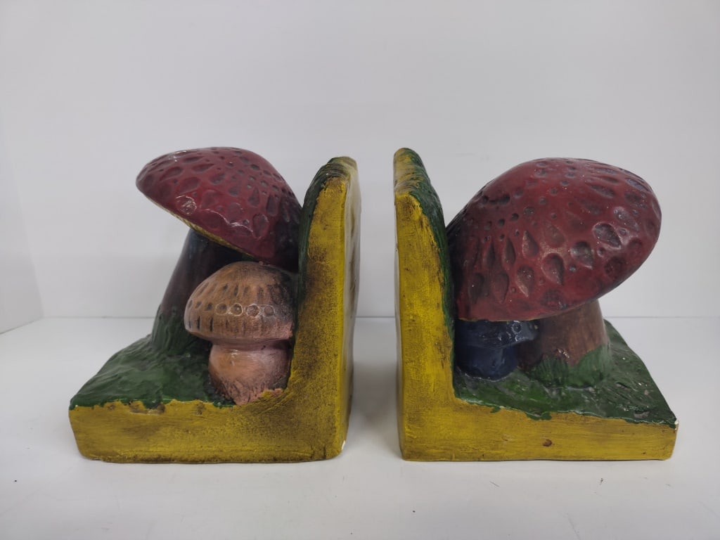 Vintage Gnome Style Mushroom Bookends: Vintage Gnome inspired mushroom design Bookends. Appears to be chalkware or plaster. Each 5in x 5in.