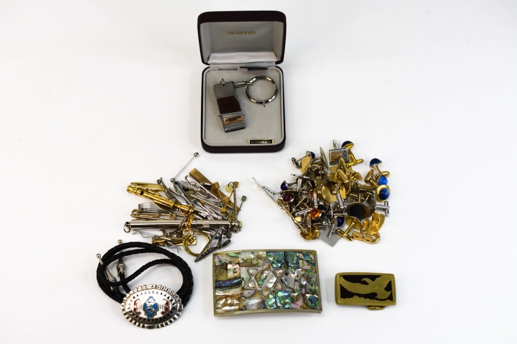 'Mens Vintage Cufflinks, Knife, Buckle and More: Includes: cufflinks, tie tacs, tie pins. key ring knife with a 10k gold emblem, abalone buckle (1 pc of abalone is missing), brass / wood inlaid buckle, bolo tie. All items are in as found condition f