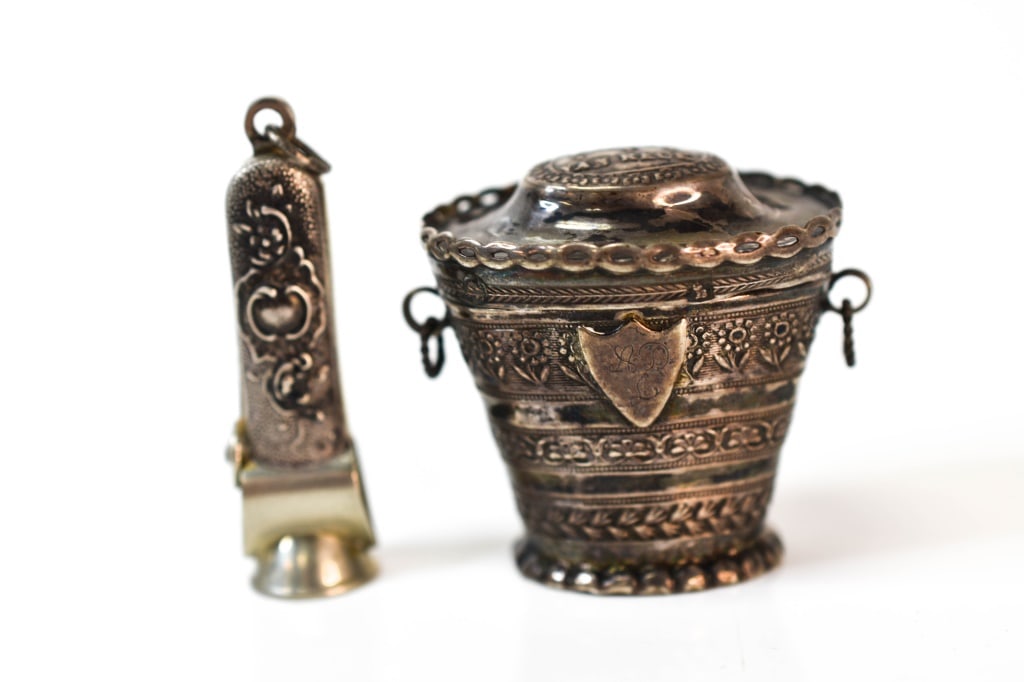 19thc. Silver Dutch Snuff Box & Cigar Cutter: Includes: (1) A silver "833" Silver snuff box with floral motif, marked on top of lid "Lekker Van Reuk", hallmarks: right facing Lion Passant #2 and makers mark on bottom. monogram "ADL" framed in a s