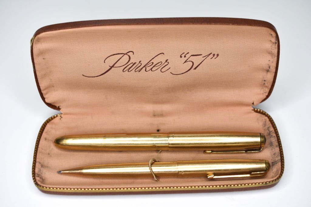Parker 51 14k Gold Filled Fountain Pen & Pencil: Vintage Parker fountain pen is marked 14kt gold filled with guilloche lines, and shows 2 small dings on barrel, Pen is marked 14kt gold filled model no."51" with guilloche lines, made in USA, the pen