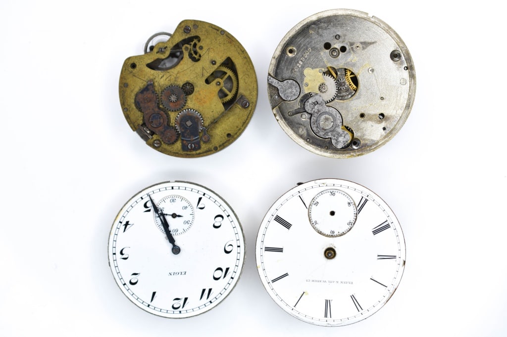 Antique Pocket Watch Movements: Includes: (1) Elgin Nat'l Co., on movement; H.H. Taylor, Elgin G.W., 19s?, lever, no. 1642061, damascened, dial shows slight crack and is missing hands, (1) Elgin, on movement; Elgin Nat'l Watch Co., 