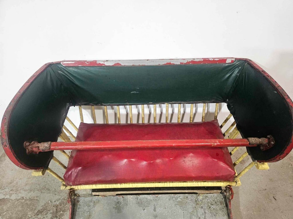 Antique Eli Ferris Wheel Seat: Includes an antique Eli Bridge Company wood Ferris wheel seat, over painted with traces of original finish beneath and has great patina. Founded by William Eli Musser 1902. Normal wear commensurate wi