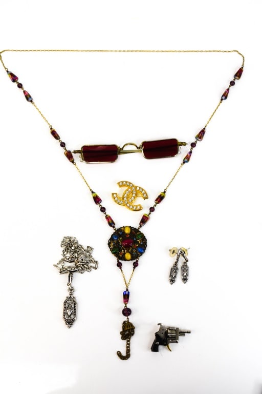 Chanel Pin, Early Red Sunglasses, Cap Gun & More: Includes: Brighton earrings and necklace, miniature Xythos Automatic 6 shot cap gun Austria (measures 1 1/2" long), multi color and pierced pendant necklace, Chanel pin, and more. Chanel pin measures