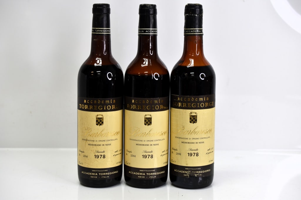 1978 Torregiorgi Barbaresco Wine: Grouping includes (3) bottles of 1978 Accademia Torregiorgi Barbaresco red wine. One bottle appears to have a fill level at mid-shoulder. This fine wine is part of an estate. It was stored and located