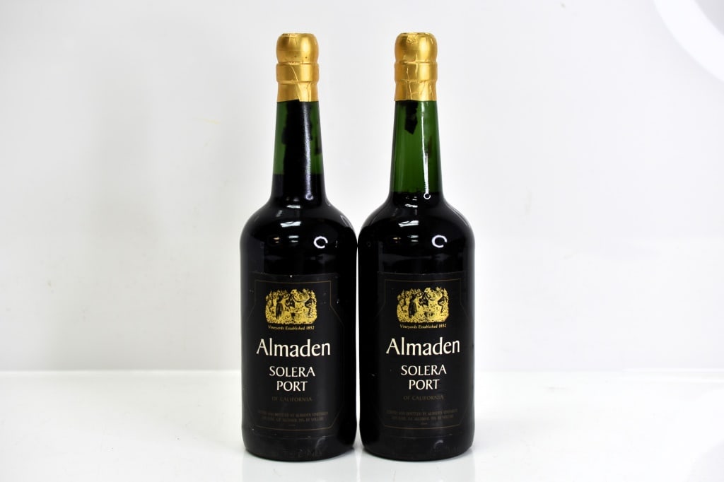 Almaden Solera Port Wine: Grouping includes (2) bottles of Almaden Solera Port Wine. This fine wine is part of an estate. It was stored and located in a dry dark temperature-controlled environment. We are not wine experts but 
