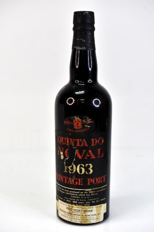 1963 Quinta Do Noval Vintage Port Wine: Includes (1) bottle of 1963 Quinta Do Noval Vintage Port. This fine wine is part of an estate. It was stored and located in a dry dark temperature-controlled environment. We are not wine experts but a