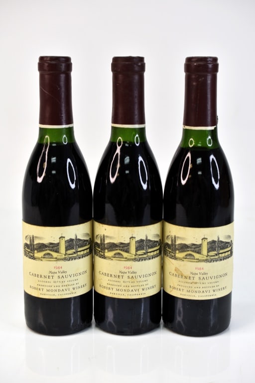 1984 Robert Mondavi Winery Cabernet Sauvignon Wine: Grouping includes (3) 350ml bottles of 1984 Robert Mondavi Winery Cabernet Sauvignon. This fine wine is part of an estate. It was stored and located in a dry dark temperature-controlled environment. W