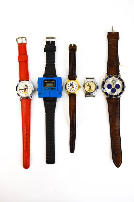 Mickey Mouse Watch & More: Grouping includes (5) vintage watches including (3) Mickey Mouse watches, (1) Express LA Quart wrist watch, and (1) vintage Quartz digital watch. All items are as in found condition from estate.