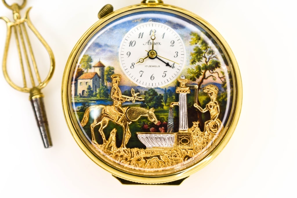 Reuge Arnex Swiss Automaton Music Watch: A Magnificent Charles Reuge Swiss Arnex automaton musical pocket watch. He started making ornate music boxes with complicated movements and bird automatons. Charles Reuge founded the Charles Reuge lin