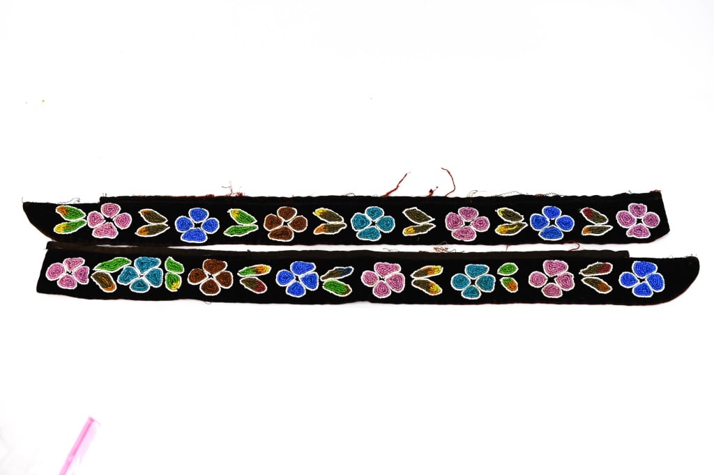 Native American Plateau / Plains Beadwork: Plateau beadwork panel, strip or part of other beadwork, measures approx. 27.5"l. There is fraying and loose strands; however, beadwork appears to be strong; staining on the red underside due to age.