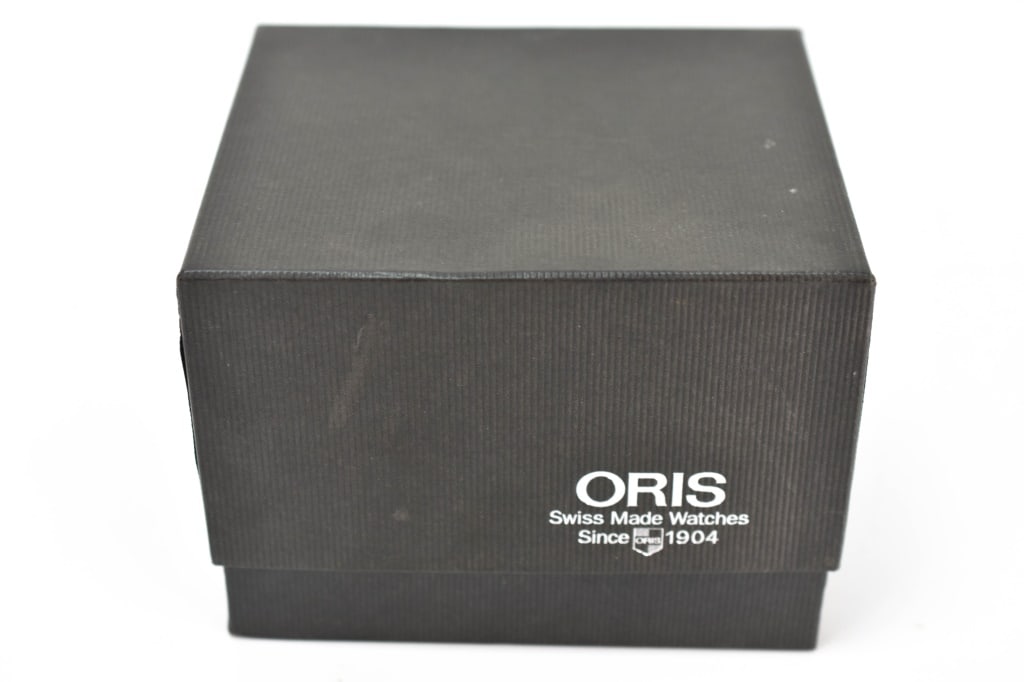 Oris Automatic Wrist Watch: Case measures approx. 35.5mm (outside diameter). Watch is in working order at time of cataloging, comes with original box, paperwork. Crystal on reverse of skeleton watch is out but included. From a p