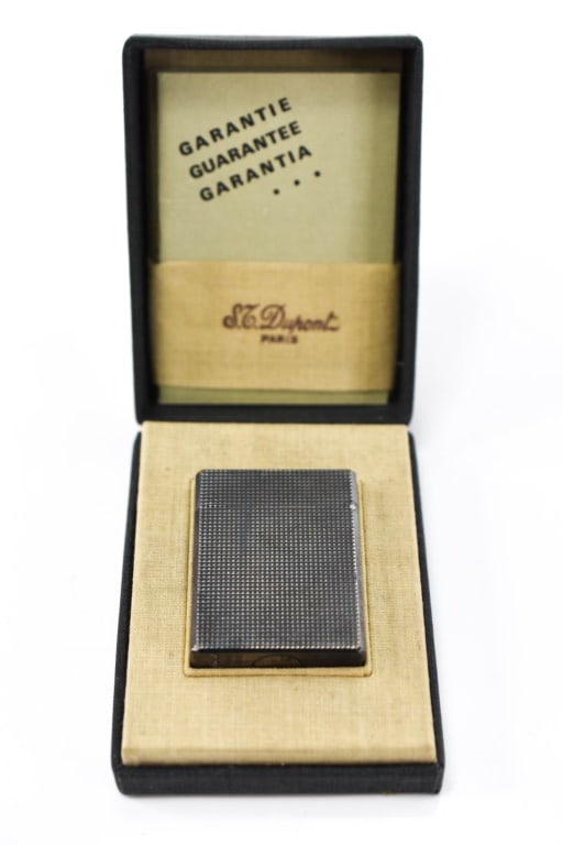 S.T. Dupont de Paris Silver Lighter: Includes an S.T. Dupont de Paris silver lighter, number appears to be HA2B64 or possibly HA2864, has makers mark, made in France. Also includes original box and manual. (Capital D monogram on lid of b