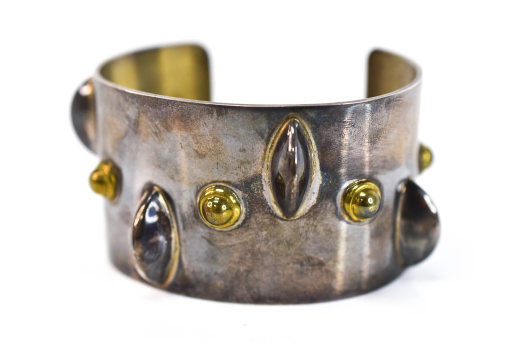 Mid-Century Modern Danish 925 Vermiel Bracelet: Sterling cuff bracelet with raised eliptical and half round balls, appears to be Danish, sterling and unidentified hallmark. Weighs approx. 79.2 grams. Provenance: From a local Dresher, PA estate. Con