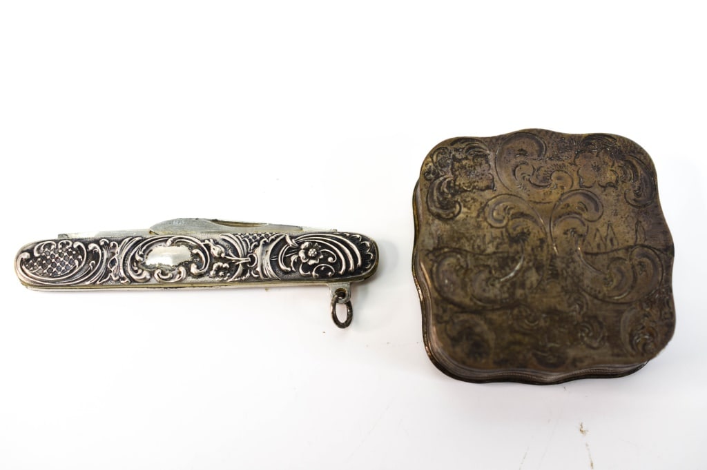Dutch Silver Snuff Box & Silver Chased Pen Knife: Includes an engraved Dutch silver snuff box with several silver hallmarks including a lion passant facing right; also includes an .800 silver chased pen knife. Knife measures approx. 2 7/8" and total 