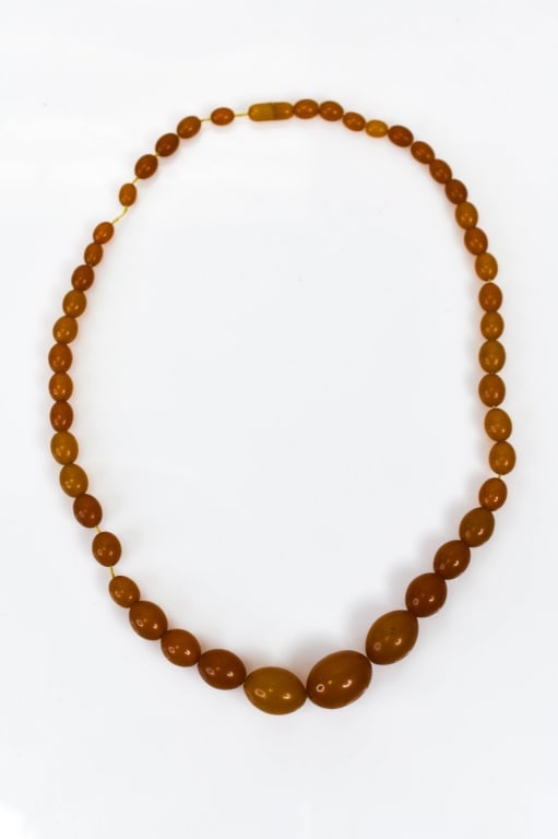 Faux Amber Beaded Necklace: Includes faux amber-colored 23" graduated beaded necklace, (attributed to being bakelite).
