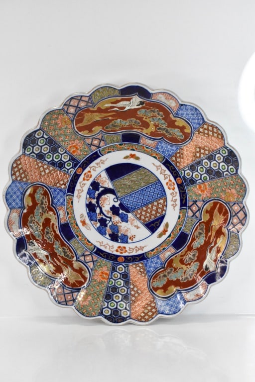 Antique Japanese Porcelain Imari Heron Charger: Piece appears to be in good condition; there is a chip on the underside rim that measures approx. .3"l, piece stil shows excellently. Approx. dimensions Dia: 18".