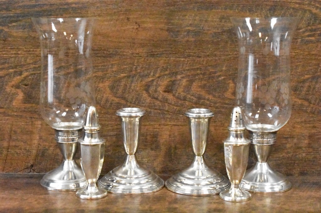 Weighted Sterling Silver Pieces: Includes 6 pcs: 1 Pair weighted sterling silver candlesticks with etched glass chimneys. Duchin Creation. 1 Pair weighted sterling silver candlesticks. Empire. 1 Pair weighted sterling silver salt and