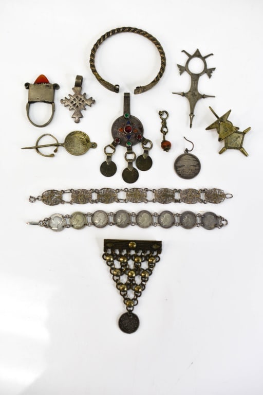 Antique Moroccan, Tuareg, Crosses, Coin Jewelry: Includes 11pcs: 1 twist bracelet (missing part of clasp), 1 Tuareg Agadez cross, 1 Tuareg cross ornament pin, 1 Moroccan penannular 5 franc (looks like 1939) coin fibula, 1 Ethiopian Coptic Cross, 1 L