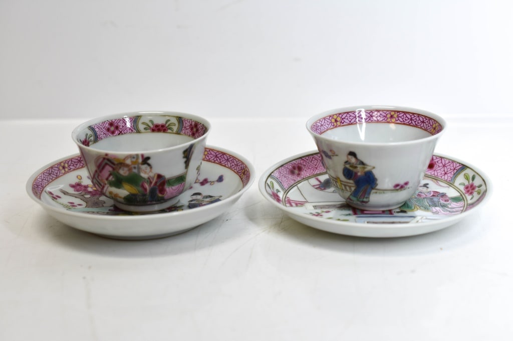 Chinese Rose Medallion Cup and Saucers: A fine collection of two cups and saucers. They are beautifully decorated. Saucers measure approx. 4.5"w, in good condition with no visible chips, cracks, breaks, or repairs.