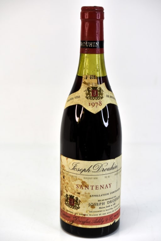 1978 Joseph Drouhin Santenay Wine: Includes (1) bottle of 1978 Joseph Drouhin Santenay red wine.This fine wine is part of an estate. It was stored and located in a dry dark temperature-controlled environment. We are not wine experts bu