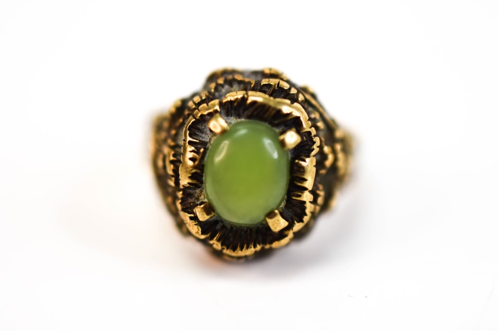 Mid Century Modern Brutalist 14K Gold Jade Ring: Jewelry includes:Vintage ladies 14k gold ring with latticework, prong set, and a light green cabochon jade gemstone, weighs approx. 5.75 grams or 3.7 dwt (including stone),