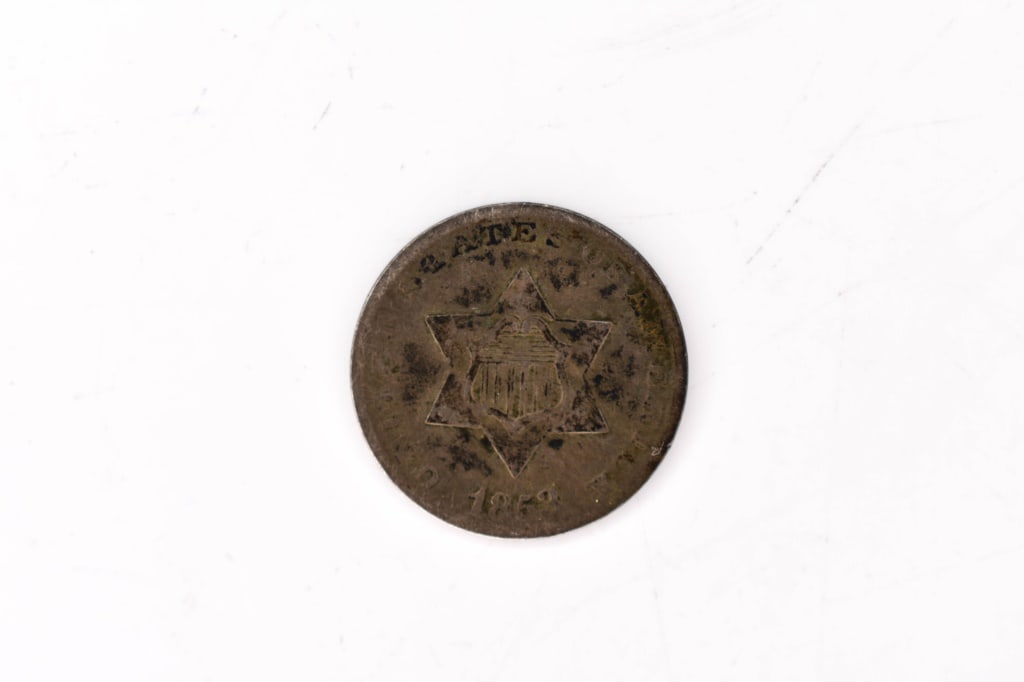 1853 three cent silver piece (1 of 2)