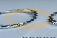 10K Yellow Gold Bangle W/ a Twist Pattern 5.5Grams