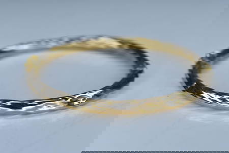 10K Yellow Gold Bangle W/ a Twist Pattern 5.5Grams
