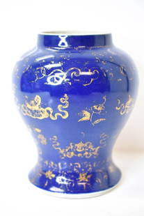 Chinese Qing Dynasty Porcelain Baluster Vase: Includes a Qing Dynasty Chinese porcelain blue glazed vase. There is a blue circular mark on the bottom, there are signs of a previous repair and there is slight loss to the gold gilt (as seen in phot