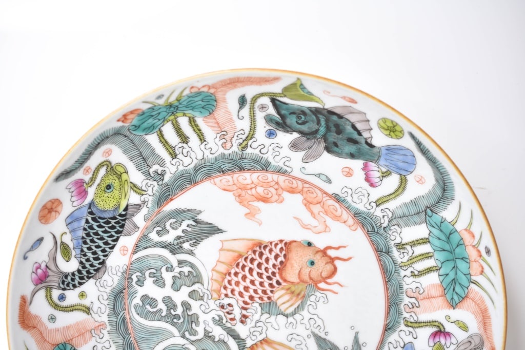 Chinese Famille Rose Plate Daoquang: Includes a Chinese porcelain famille rose plate, PERIOD OF DAOGUANG mark on bottom enameled paint. Also bares a tag on it's underside stating that it was in the Christie's March 29th 2007 Asian Art Sa