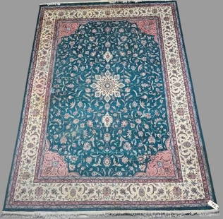 Indo Turkish Green & Cream Silk Rug: Shows some wear. Color does run in one area. Has some moth damage along edges of rug. Measures approximately 12' 10" x 8' 11".