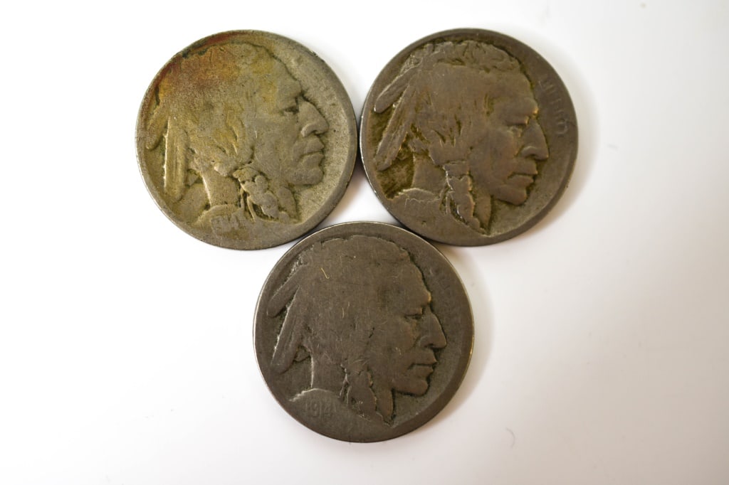 1914 p d s Buffalo Nickels: Philly is easy to read. Denver is worn hard and date is faint. San Francisco has a stain on his head. All are in circulated condition.