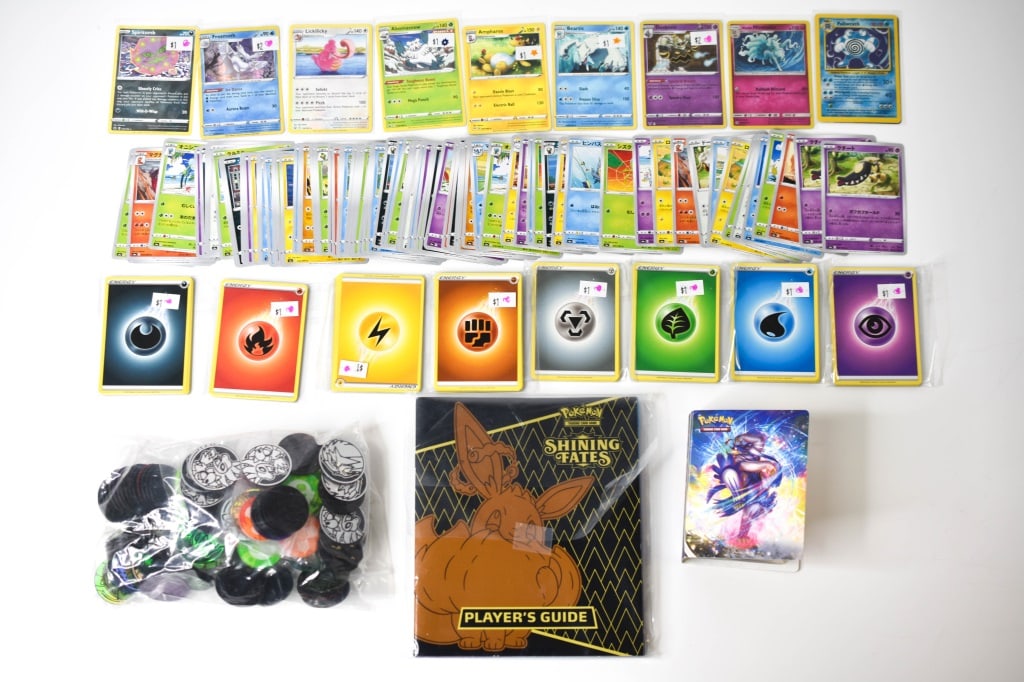 1000s of Pok?mon Cards: 3 boxes of cards. Cards are Commons, energy, uncommon, foil and others. No holos mixed in. Cards can show worn corners, edge wear, creases and overall general wear. I'm not sure if the online cards we
