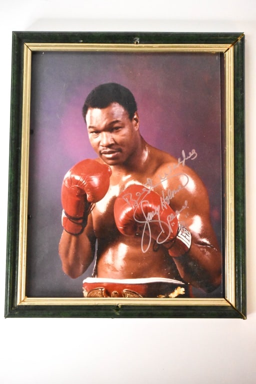 Larry Holmes Autographed Photo: No COA. Signed with a Silver marker. Best Wishes Larry Holmes Speed ? 86. You can see the flow of the signature, lapping of letters, and different pressure areas. Overall size of the frame is 9.25 x 1