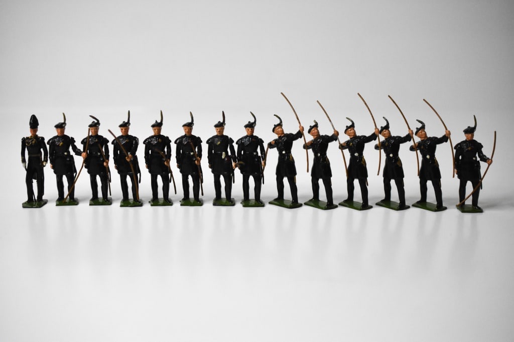 Britains Lead Royal Company of Archers: 1 officer, 8 Archers standing at attention and 5 in shooting position. Roughly 2.25 inches tall. Some paint loss in areas.