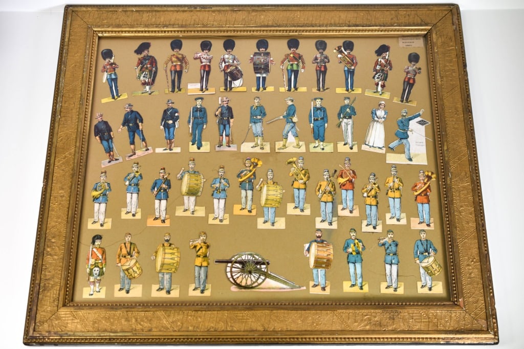 5 Framed Cardboard Papef Soldiers Groupings: 2 of them are from Spain. 1 is a supplement to Boston Sunday Globe March 22 1896. Can't tell if it is a reprint or not. Frame with the 3 rows of cardboard soldiers is 36 x 12 inches. I didn't remove a