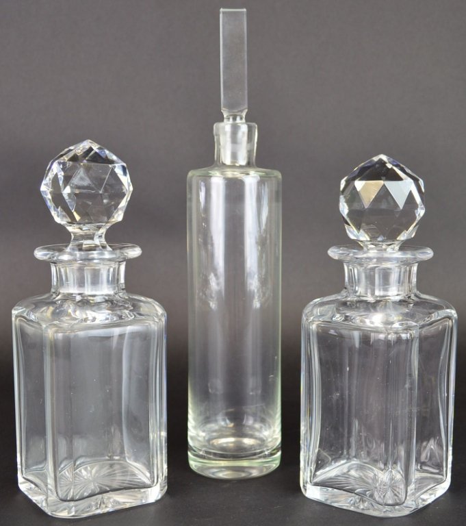 Cut Glass Decanters Lot Val St. Lambert Quality: 3 decanter lot, tallest measuring 12 and the other 2 measuring 2" with stoppers. High quality, estate found, bottoms are ground, with facetted necks and stoppers in the style of Val St Lambert"