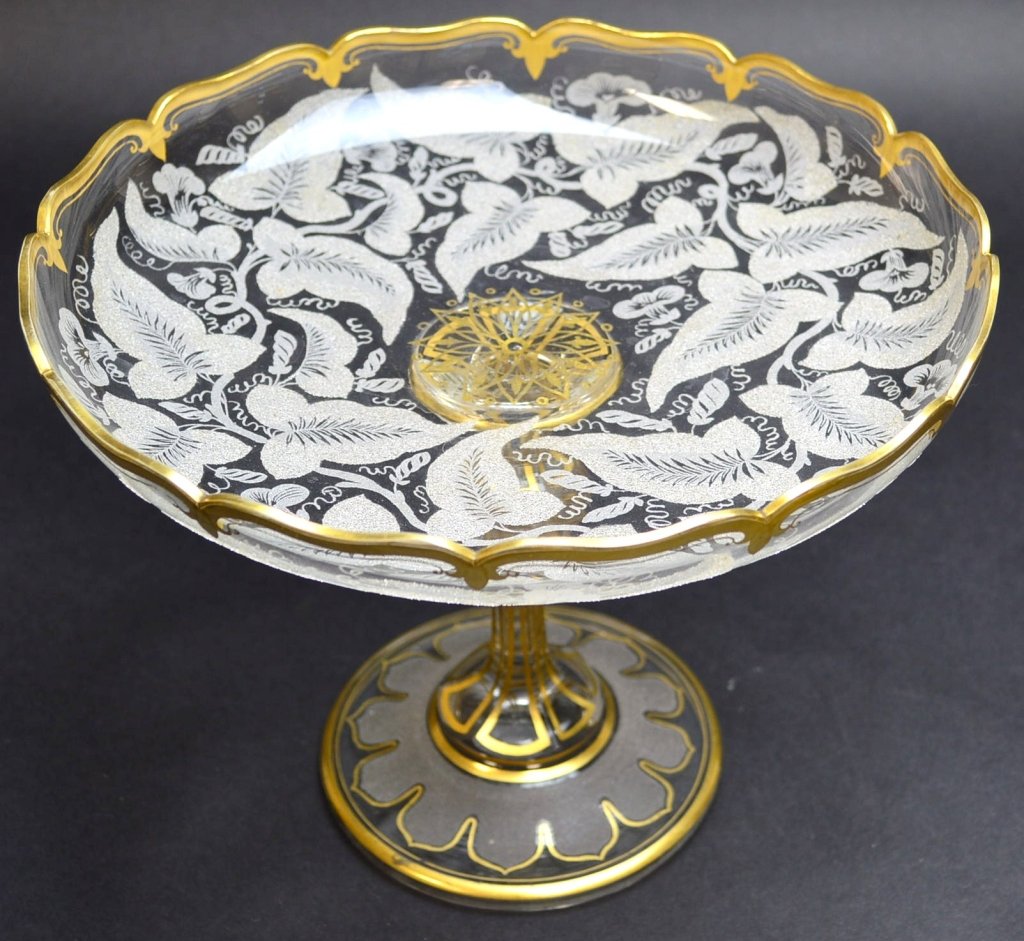 A Fine Gilt & Acid Etched Compote: Awesome compote with faceted stem, gilt decorations, and acid etched designs. measures 7T x9" W"