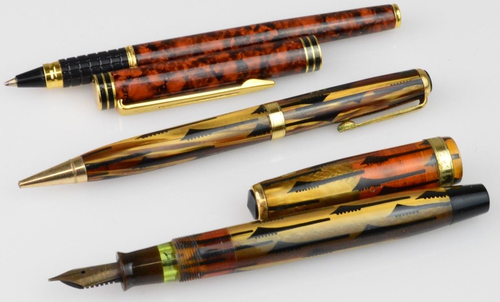 Waterman and Parker Pen and Pencil Lot: Lot includes a Waterman roller pen, Parker Fountain Pen and Matching Parker Pencil, in used condition