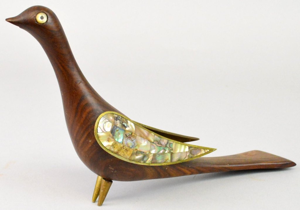 Los Castillo Mid Century Table Sculpture: Los Castillo Bird sculpture made of wood with abalone and brass wings, measures 11 x 6 inlaid Los Castillo mark, minor damage underneath the beak.