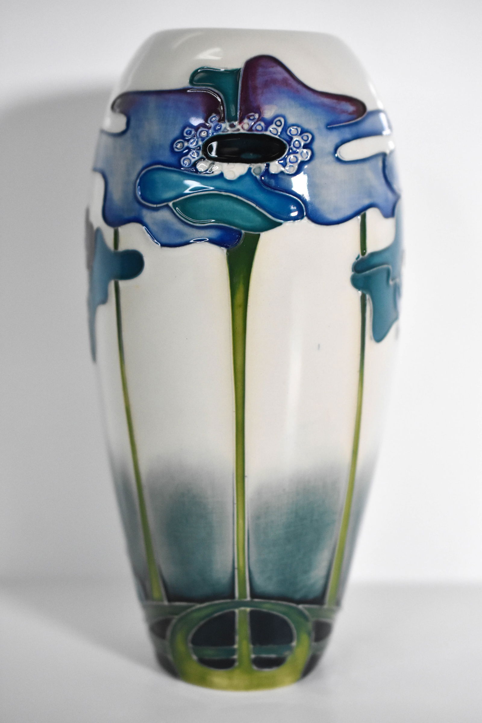 Moorcroft “Blue Heaven?? Vase by Nicola Slaney: "A finely crafted Moorcroft pottery vase, tubeline decorated in the striking “Blue Heaven” pattern by designer Nicola Slaney. The ovoid form features flowing floral motifs in soothing blue